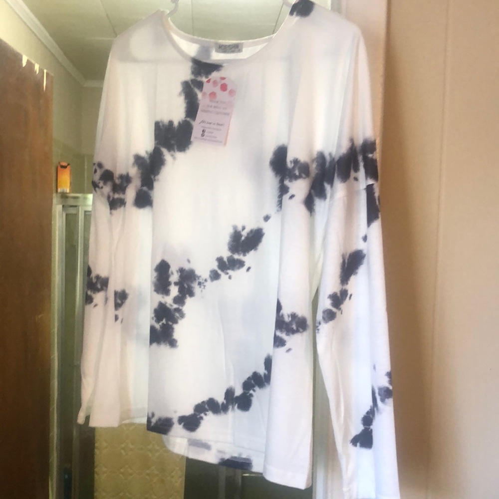 Long sleeve t-shirt. Brand new with tags. Never worn. Non smoking home